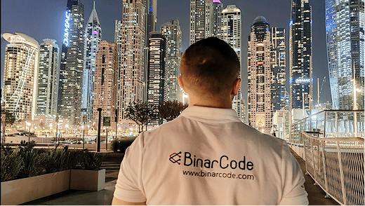BinarCode team member overlooking the city