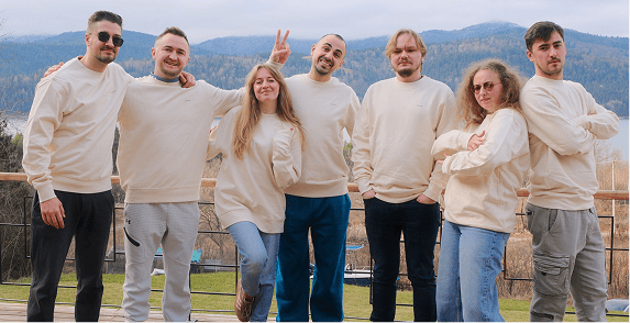 BinarCode team posing together outdoors